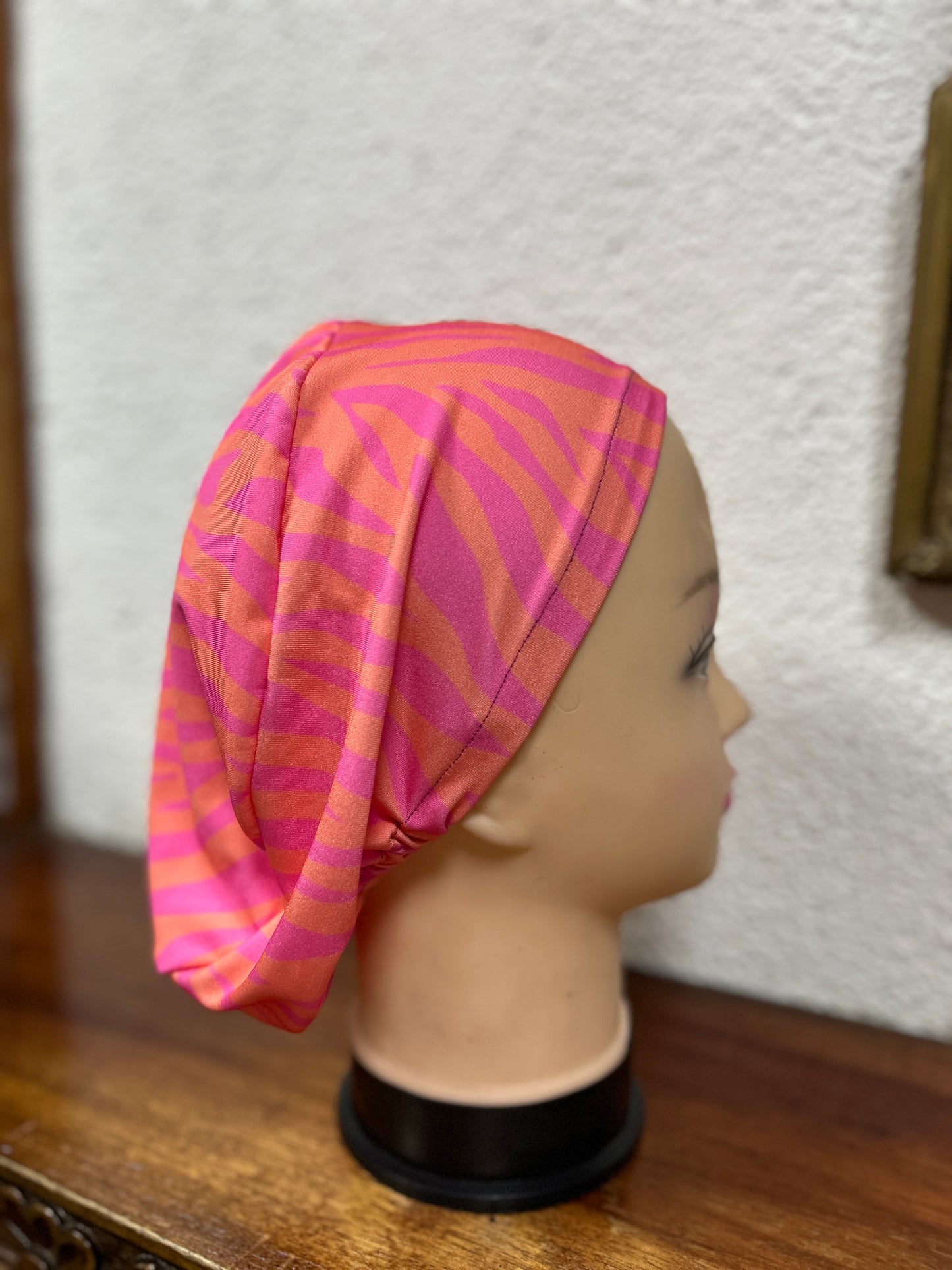 Cofia cebra naranja/fucsia