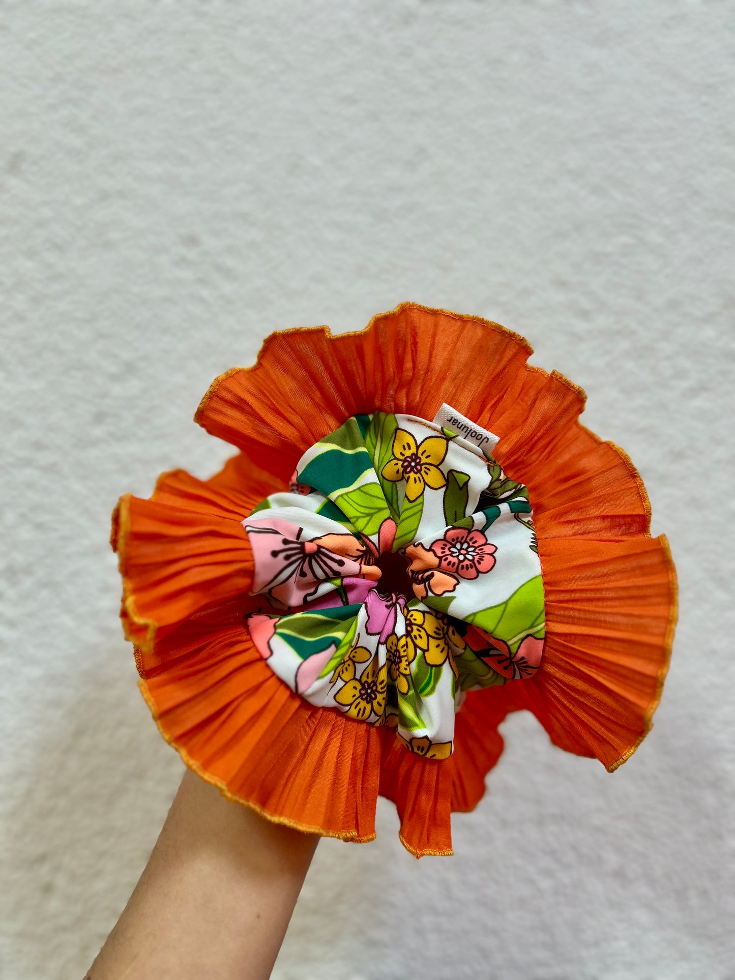 Rumba naranja flores