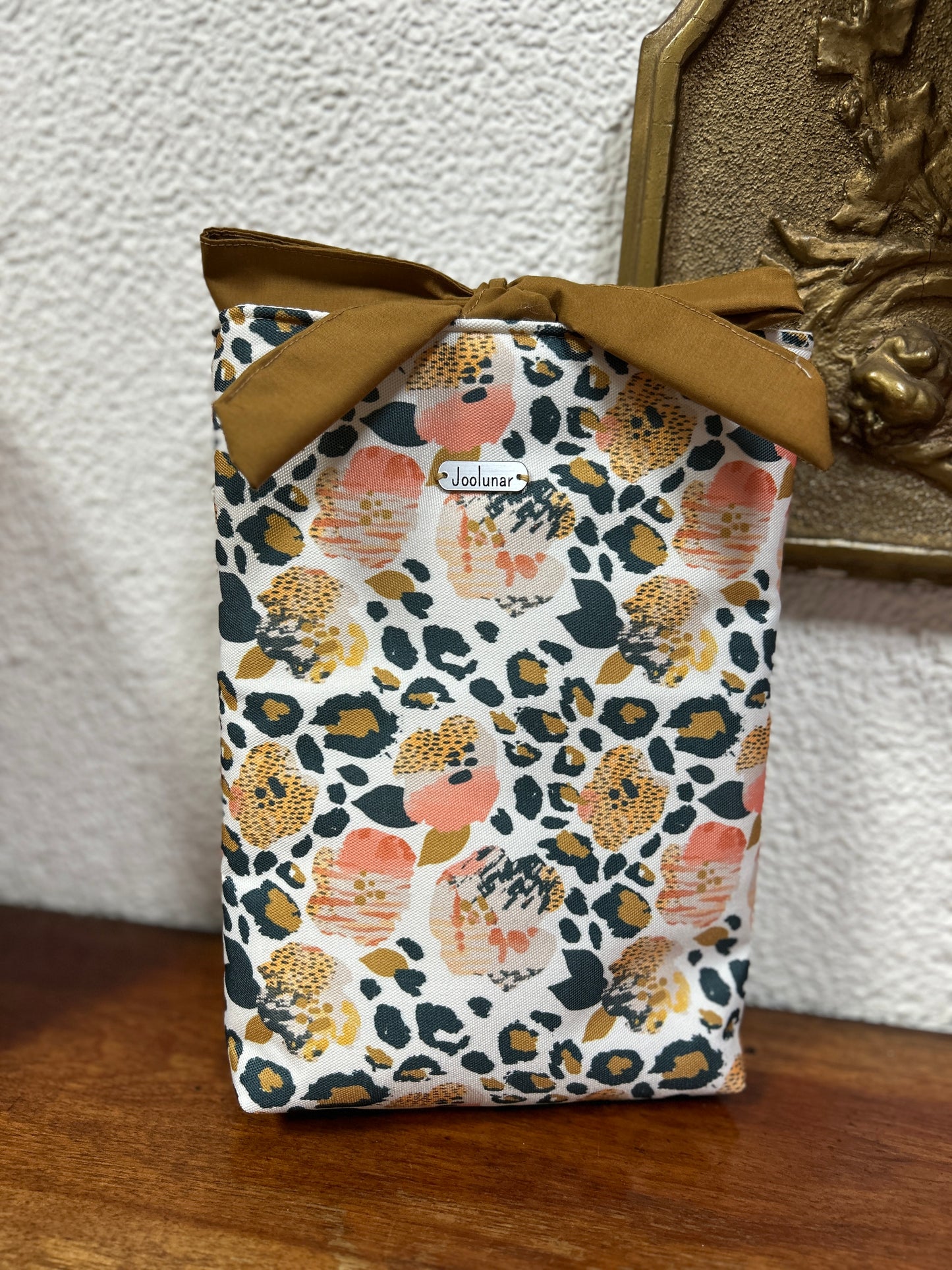 Funda animalprint negro/damasco
